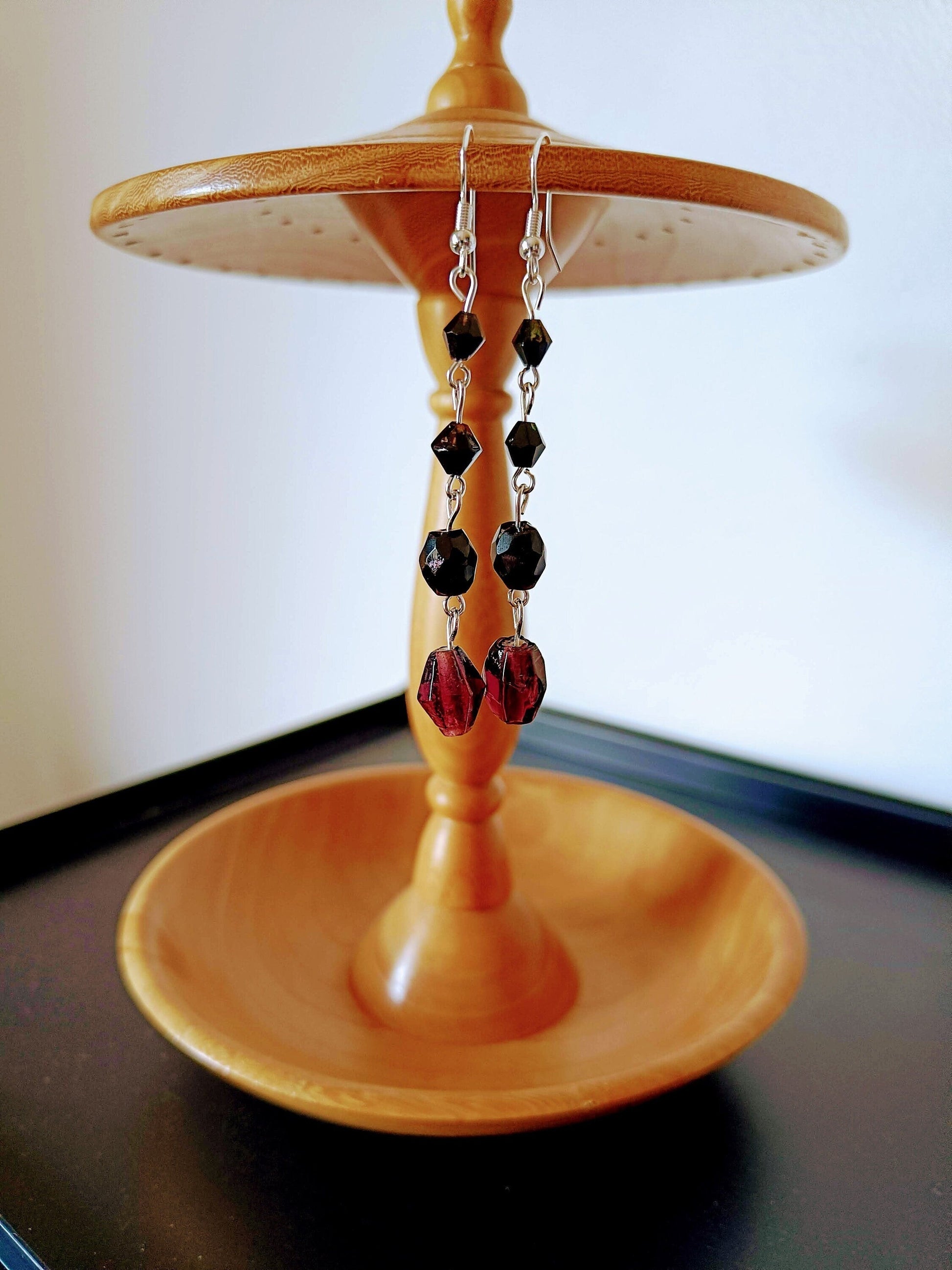 Long vintage glass earrings with purple beads and sterling silver ear wires.