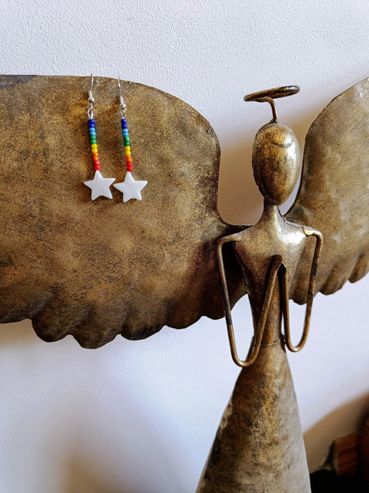 Rainbow Star Earrings with repurposed rainbow glass beads and white star-shaped shells on sterling silver ear wires.