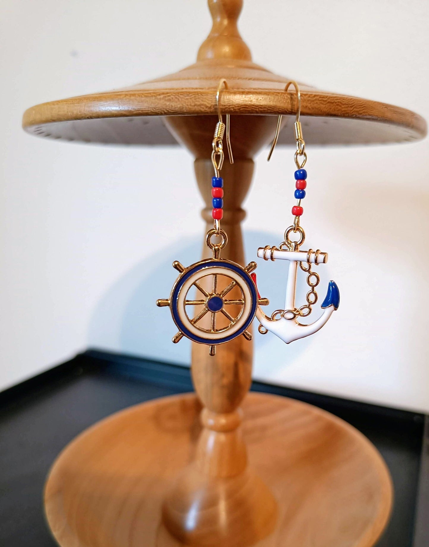Jeannie Sailor Earrings with anchor and ship's wheel charms, crafted from repurposed glass seed beads and antique gold plate.