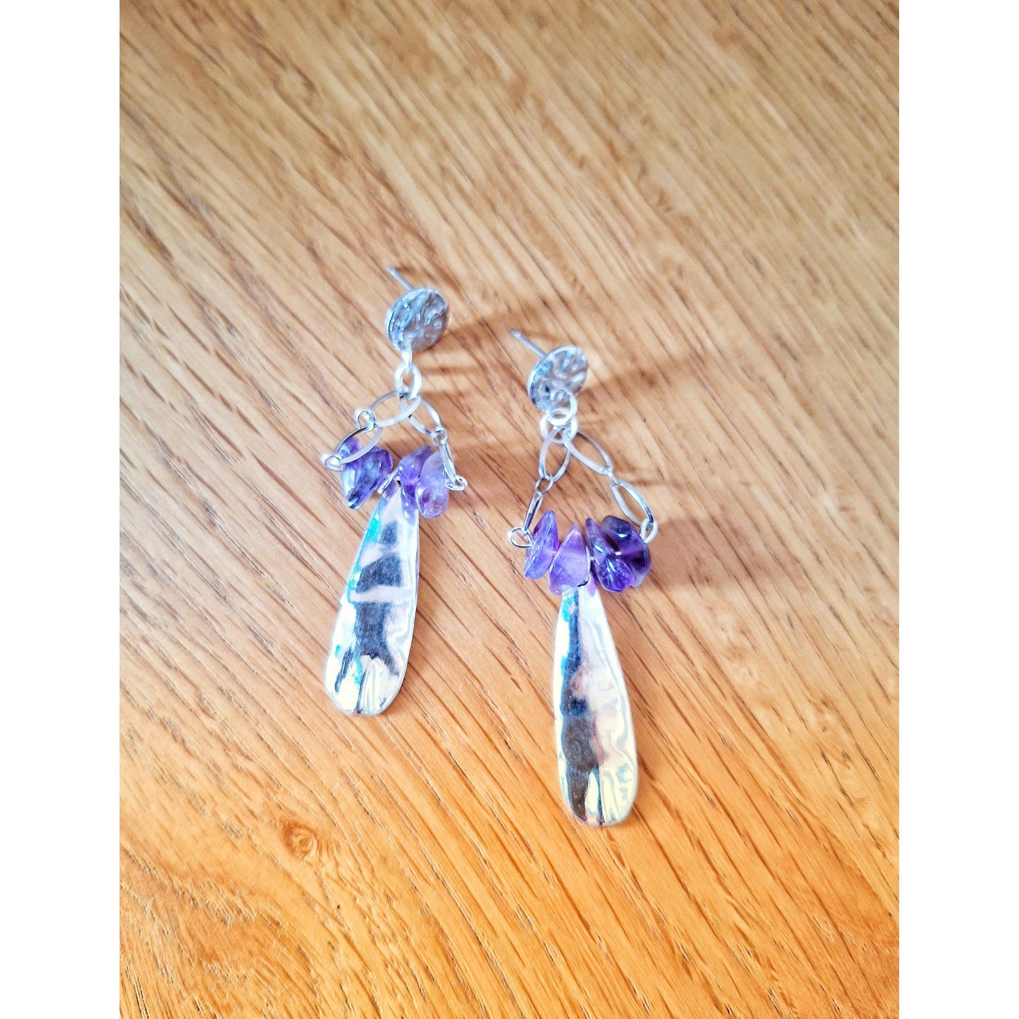 Aurora Chandelier Earrings with amethyst chips on stainless steel, elegant and sustainable jewelry.