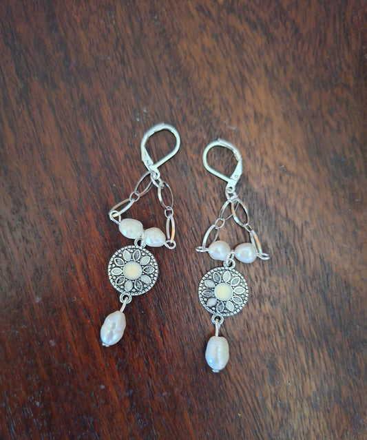 Gabrielle Chandelier Earrings with freshwater pearls and enamelled disc on stainless steel chains.