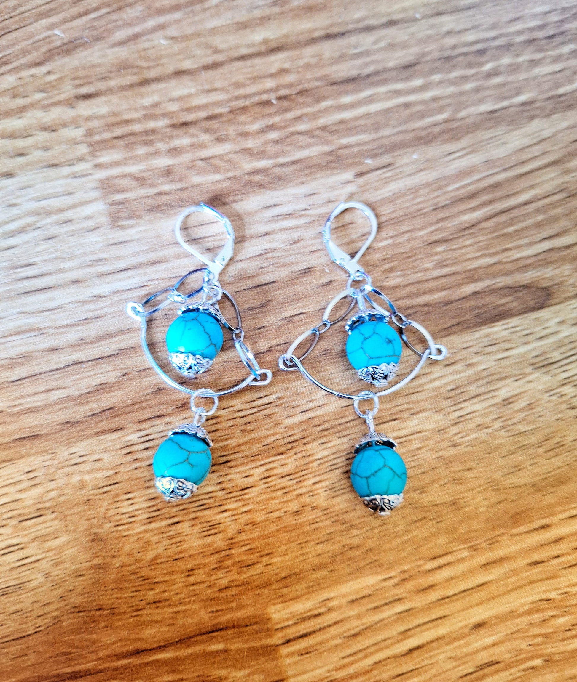 Azula Chandelier Earrings crafted with turquoise stone beads and sterling silver.