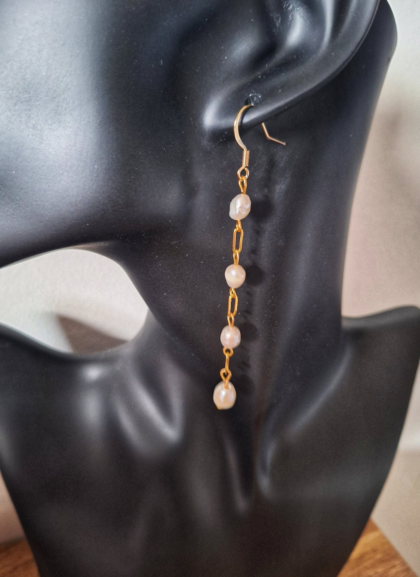 Elegant Vivienne Pearl Drop Earrings in gold with freshwater pearls and gold-plated chain.