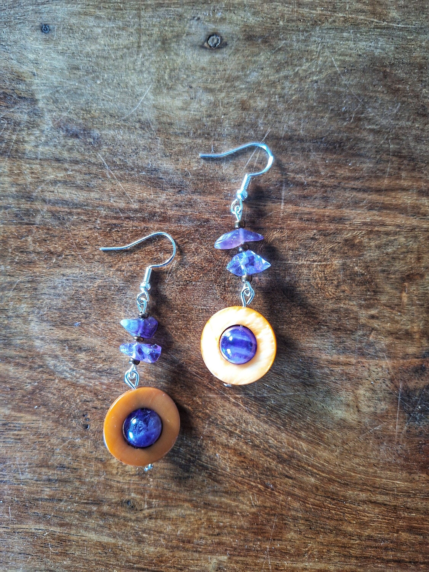 Jasmine Drop Earrings with amethyst and shell beads on sterling silver wires.