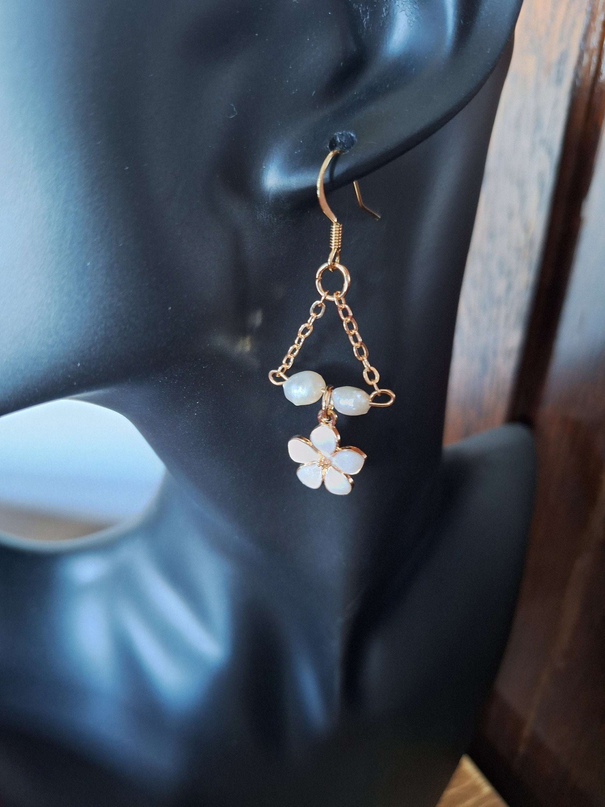 Naomi Cherry Blossom Pearl Earrings with gold-plated chain and repurposed freshwater pearls.