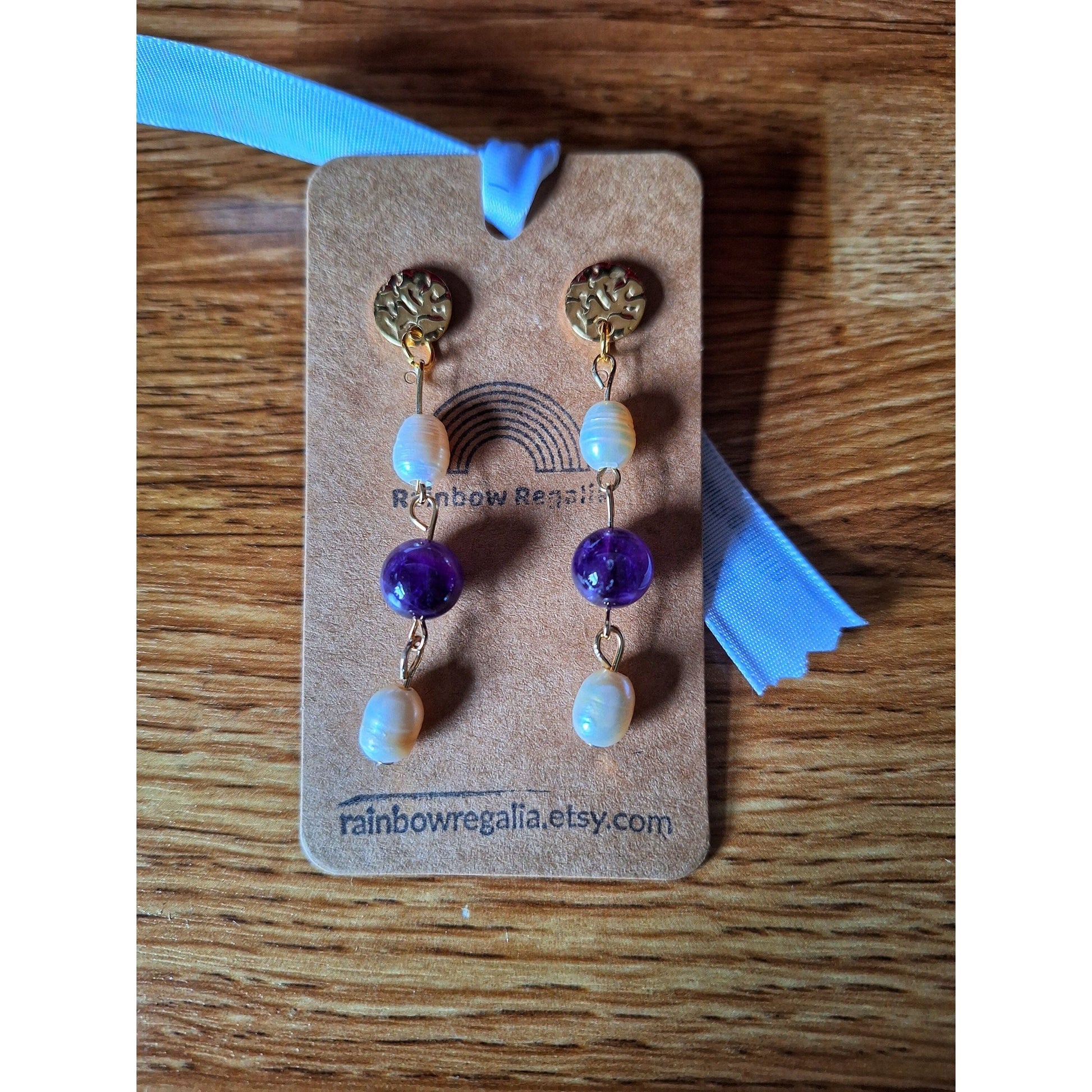 Elizabeth Pearl and Amethyst Earrings with freshwater pearls and amethyst on gold-plated stainless steel posts.
