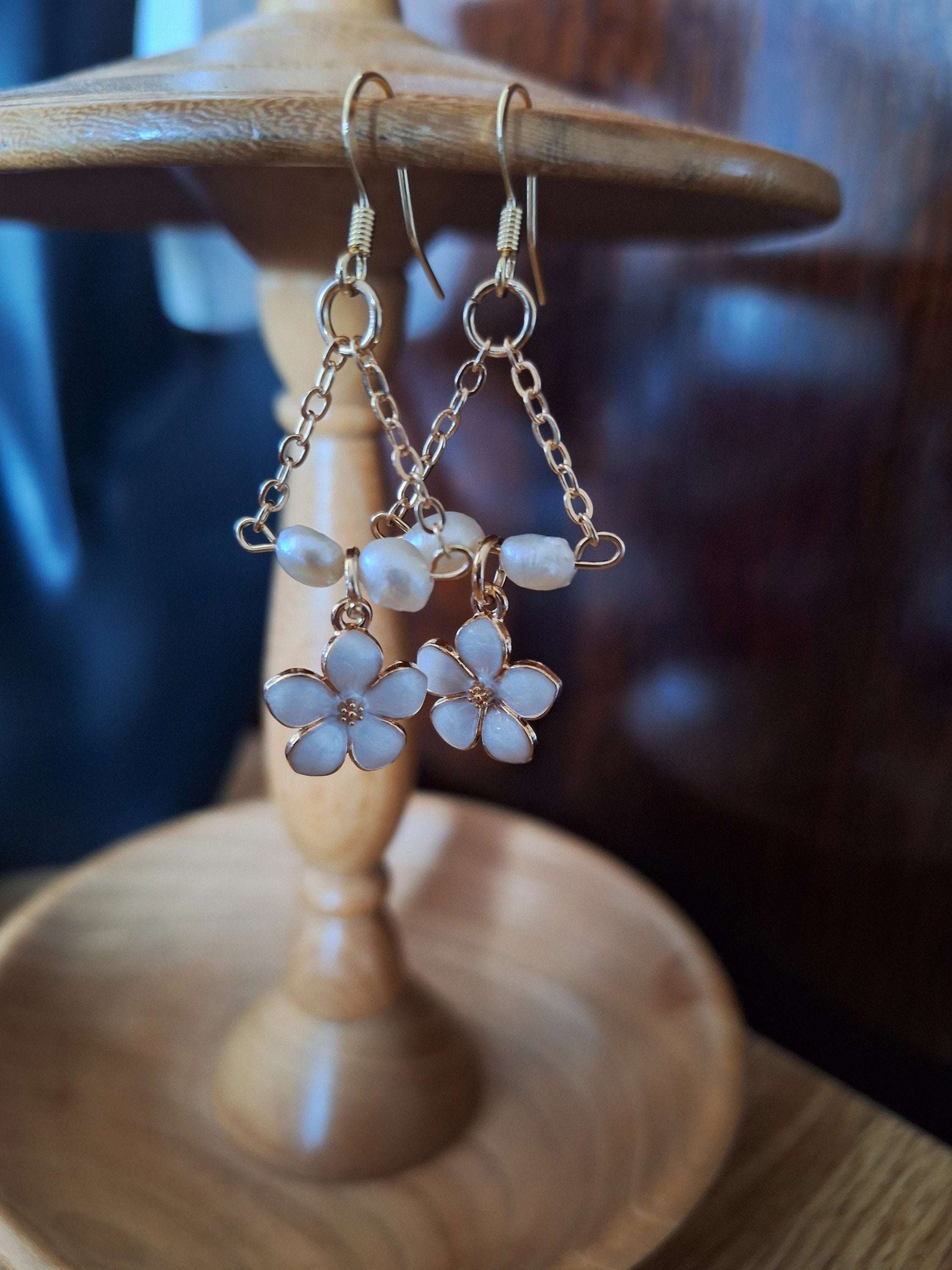 Naomi Cherry Blossom Pearl Earrings with freshwater pearls and gold-plated chain.