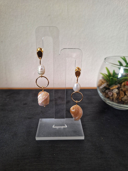 Isabella pearl earrings with freshwater pearls and mother of pearl shells on gold-plated studs.