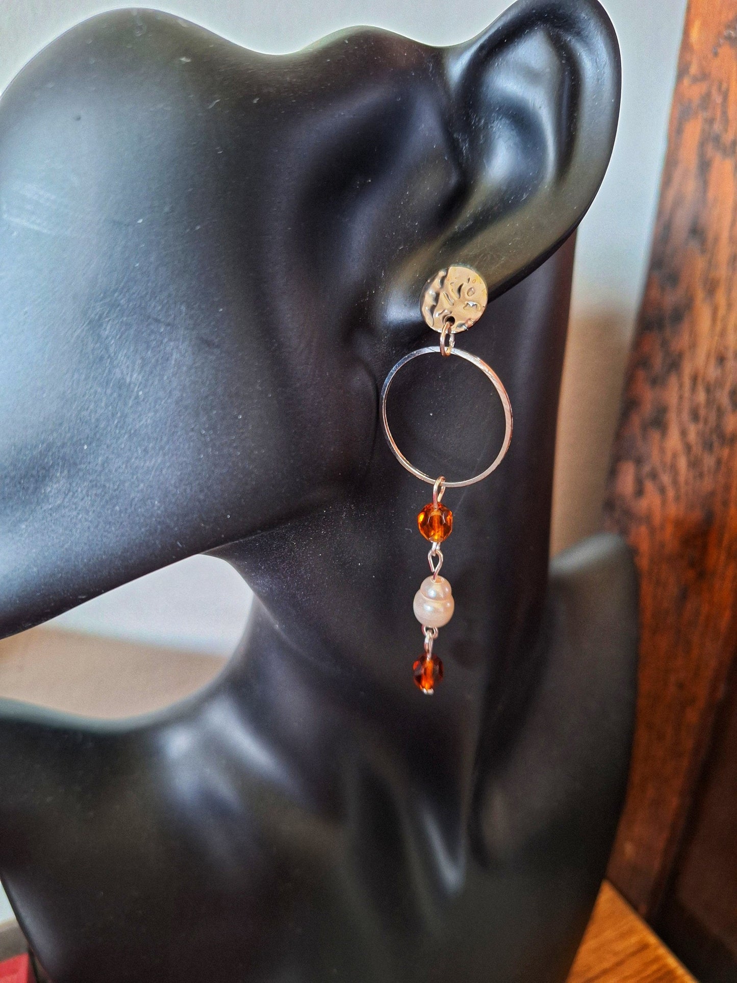 Anastasia pearl and vintage bead earrings with amber-hued faceted glass beads.