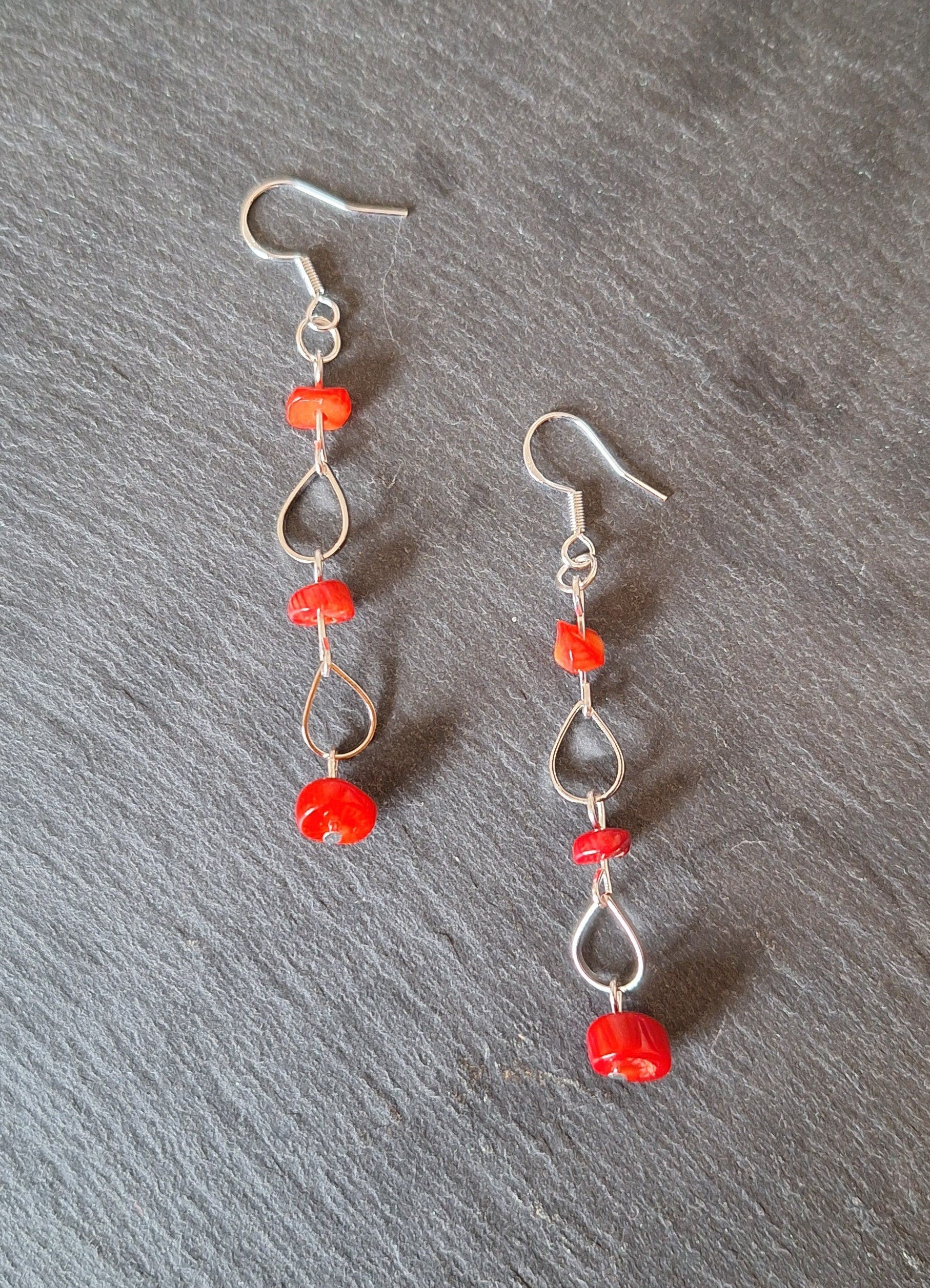 Salacia Coral Earrings made with repurposed red coral and sterling silver wires, 70mm dangle.
