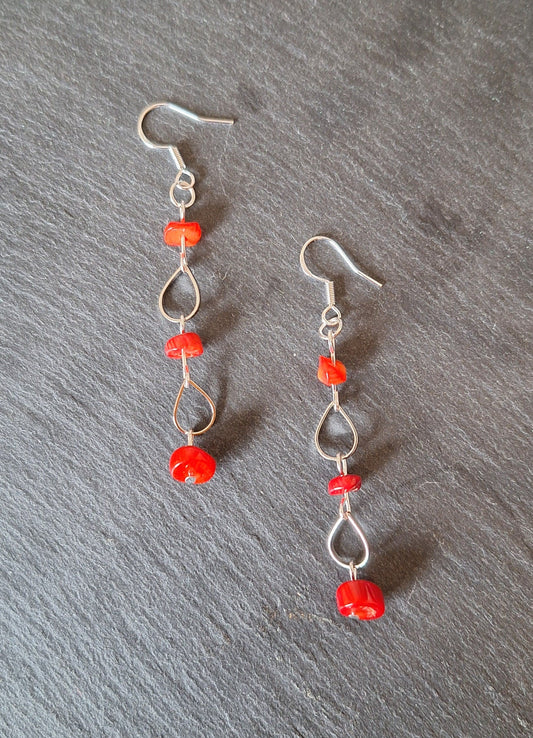 Salacia Coral Earrings made with repurposed red coral and sterling silver wires, 70mm dangle.