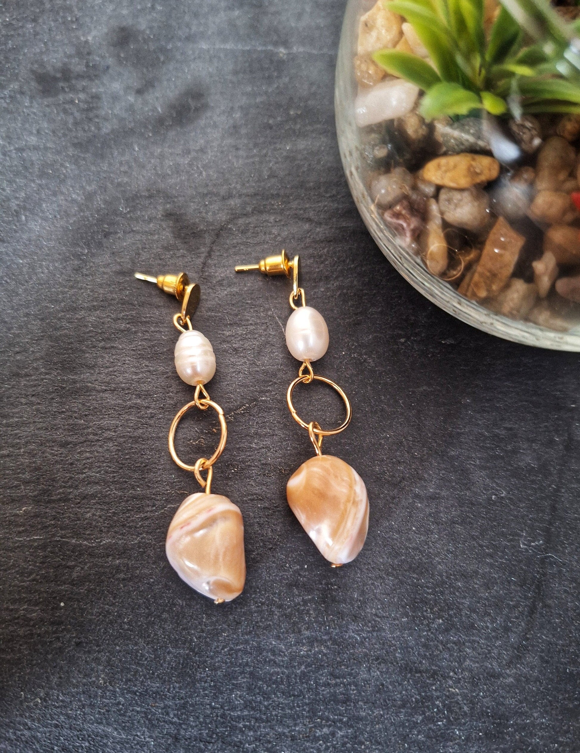 Isabella pearl earrings with freshwater pearls and mother of pearl shells on gold-plated studs.