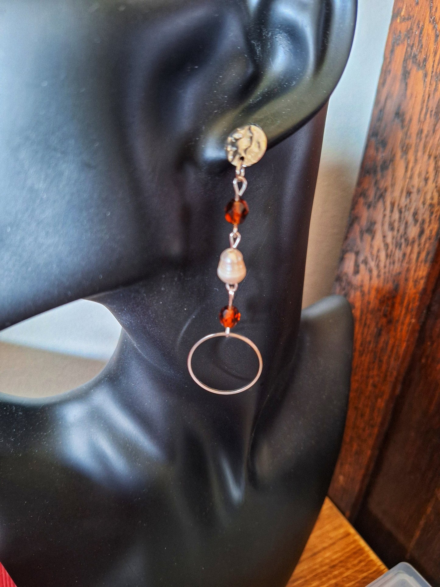 Anastasia pearl and vintage bead earrings with repurposed freshwater pearls and amber-hued glass beads on display.