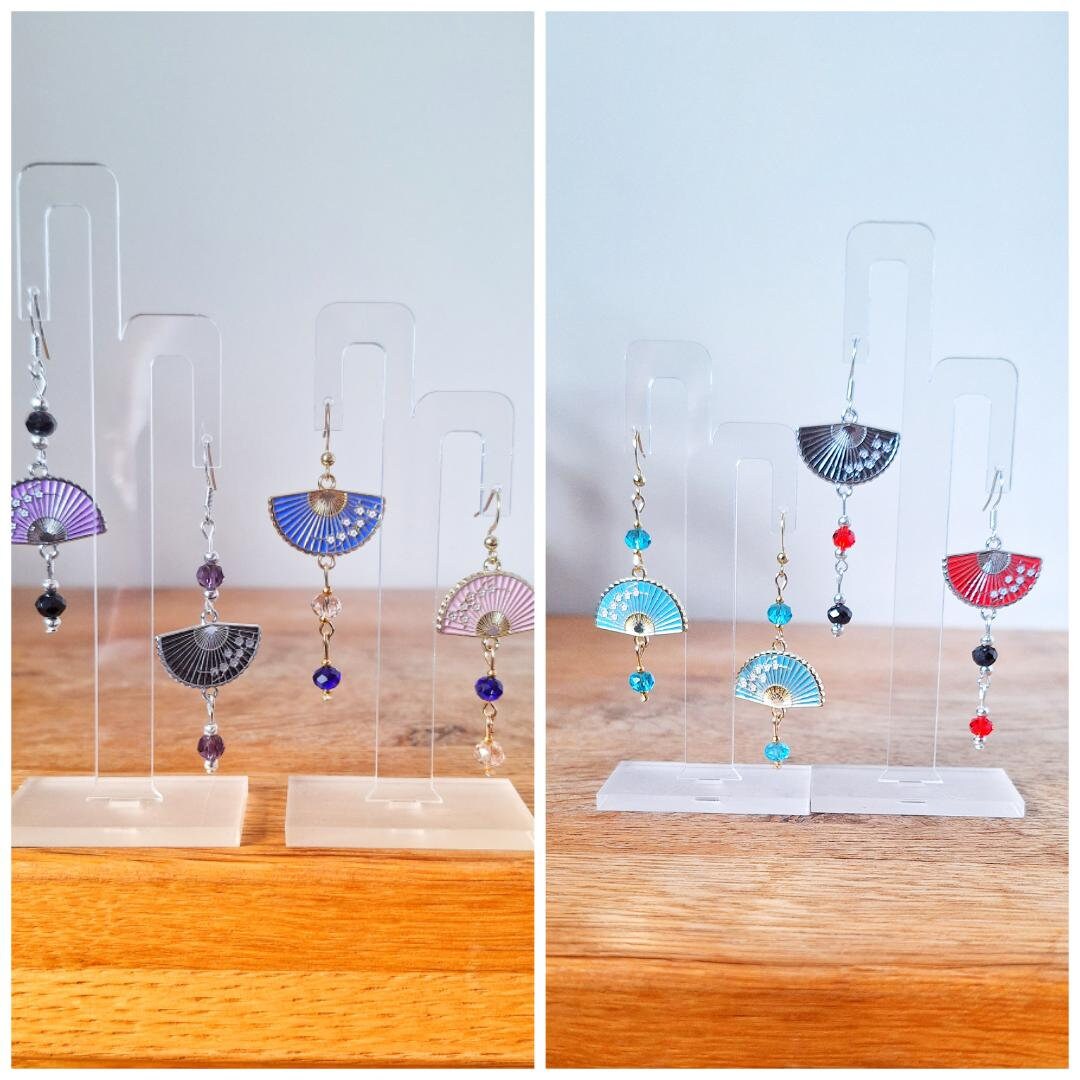 Fumika Fan Earrings with repurposed faceted glass beads and fan charms in various colors, on display.