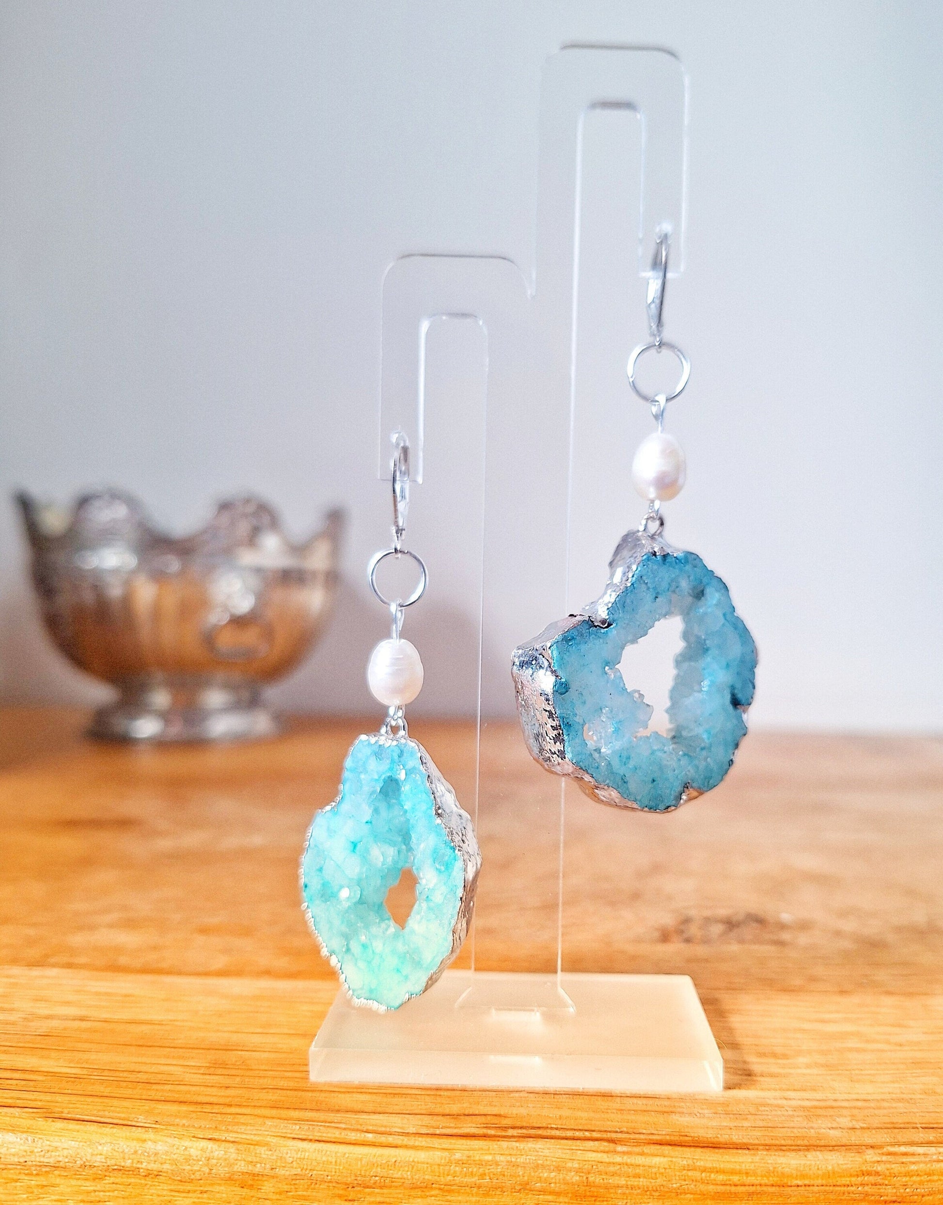 Pandora Green Quartz and Pearl Earrings with silver-plated green quartz and freshwater pearls on sterling silver lever back ear wires.