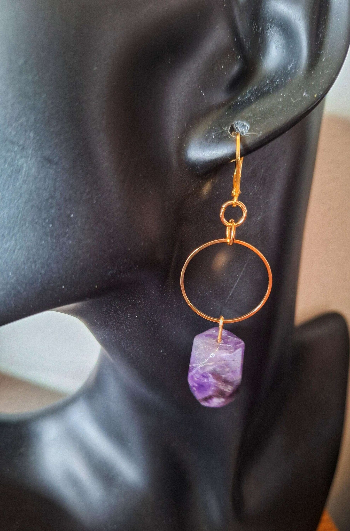 Florence Amethyst Earrings with gold-plated lever back ear wires and raw amethyst stone.