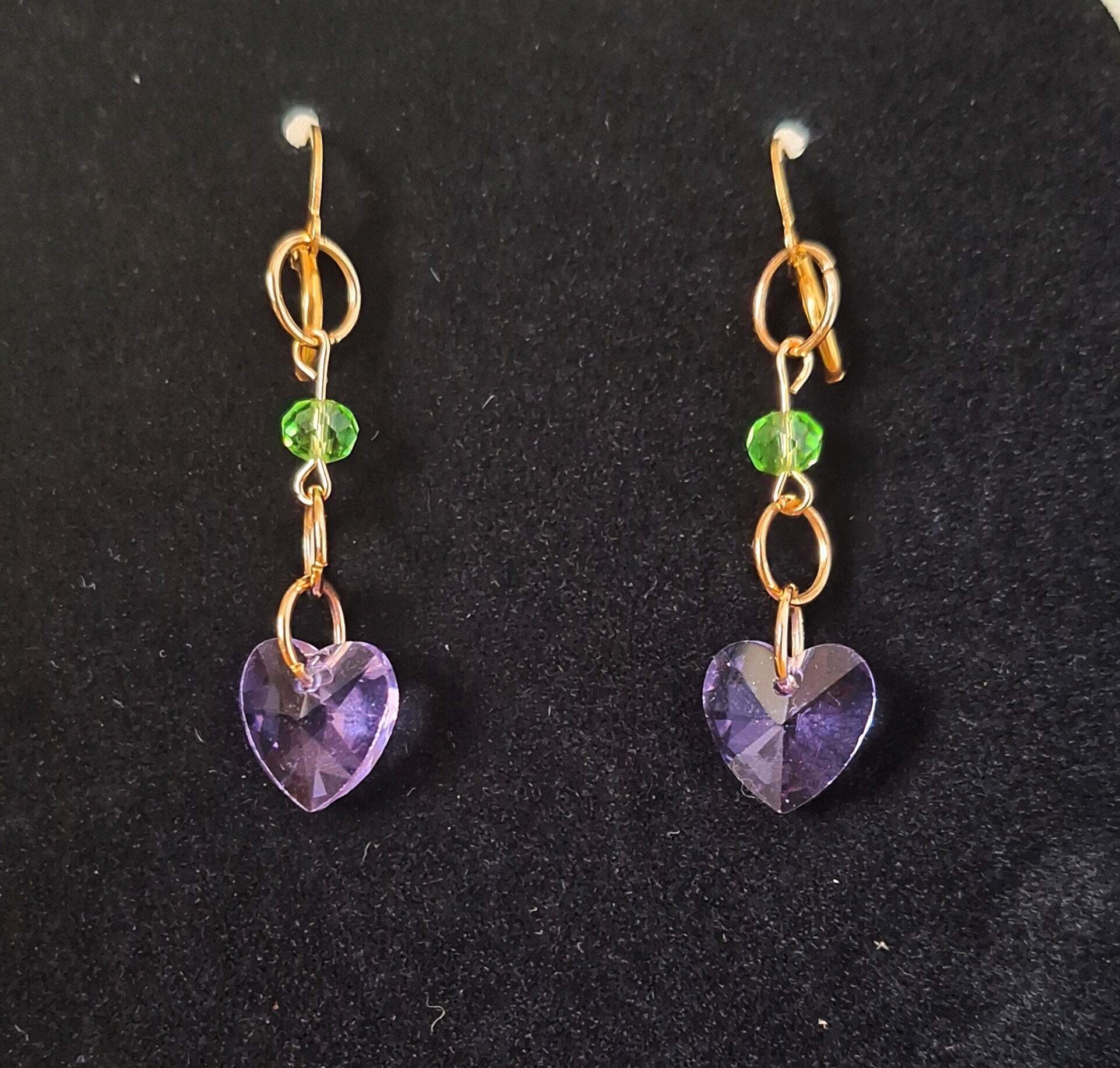 Evelyn Purple Heart Earrings with faceted glass beads on gold-plated hoops.
