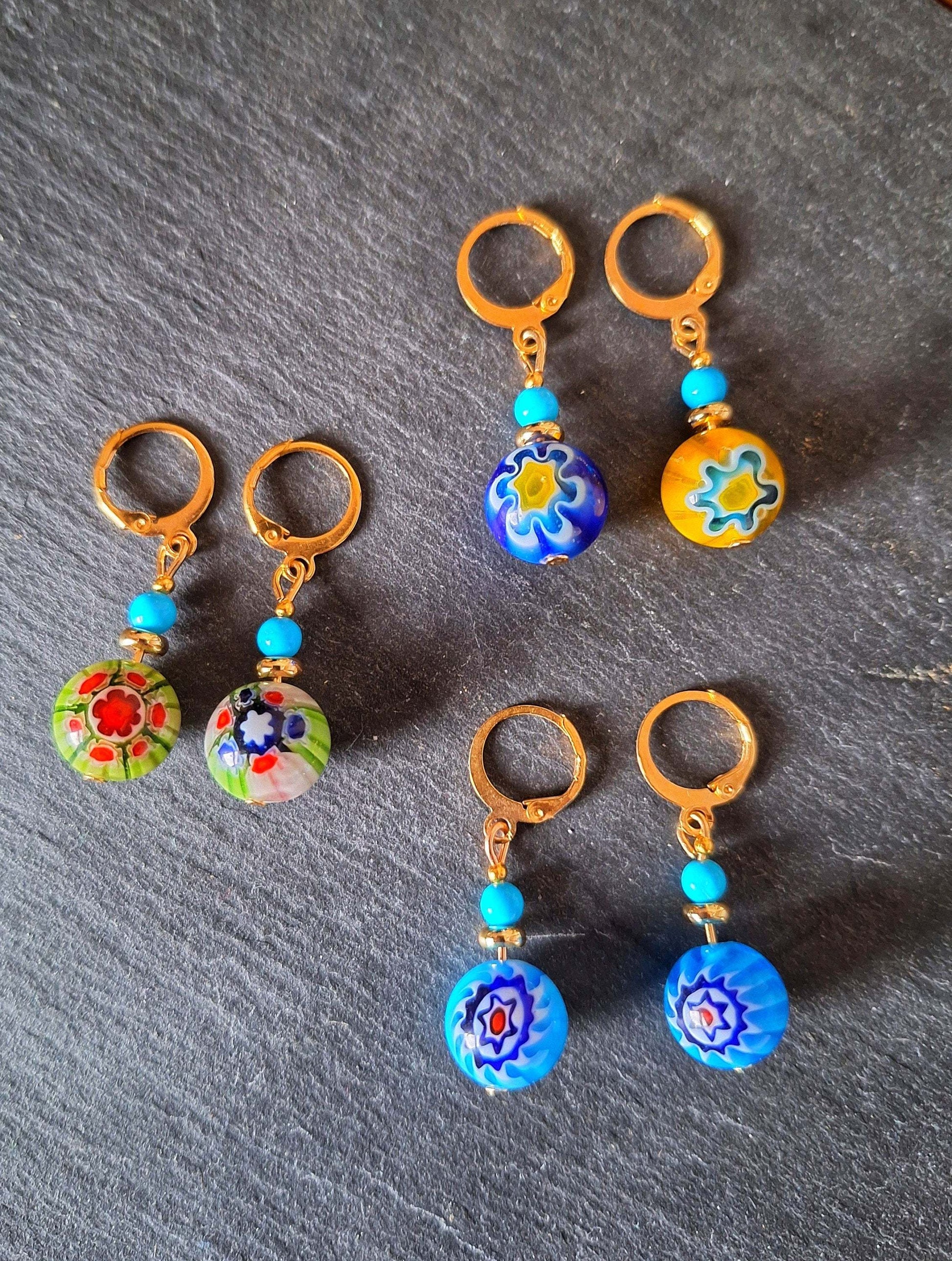 Millefiori Glass Bead Huggies with colorful designs and gold-plated huggies.