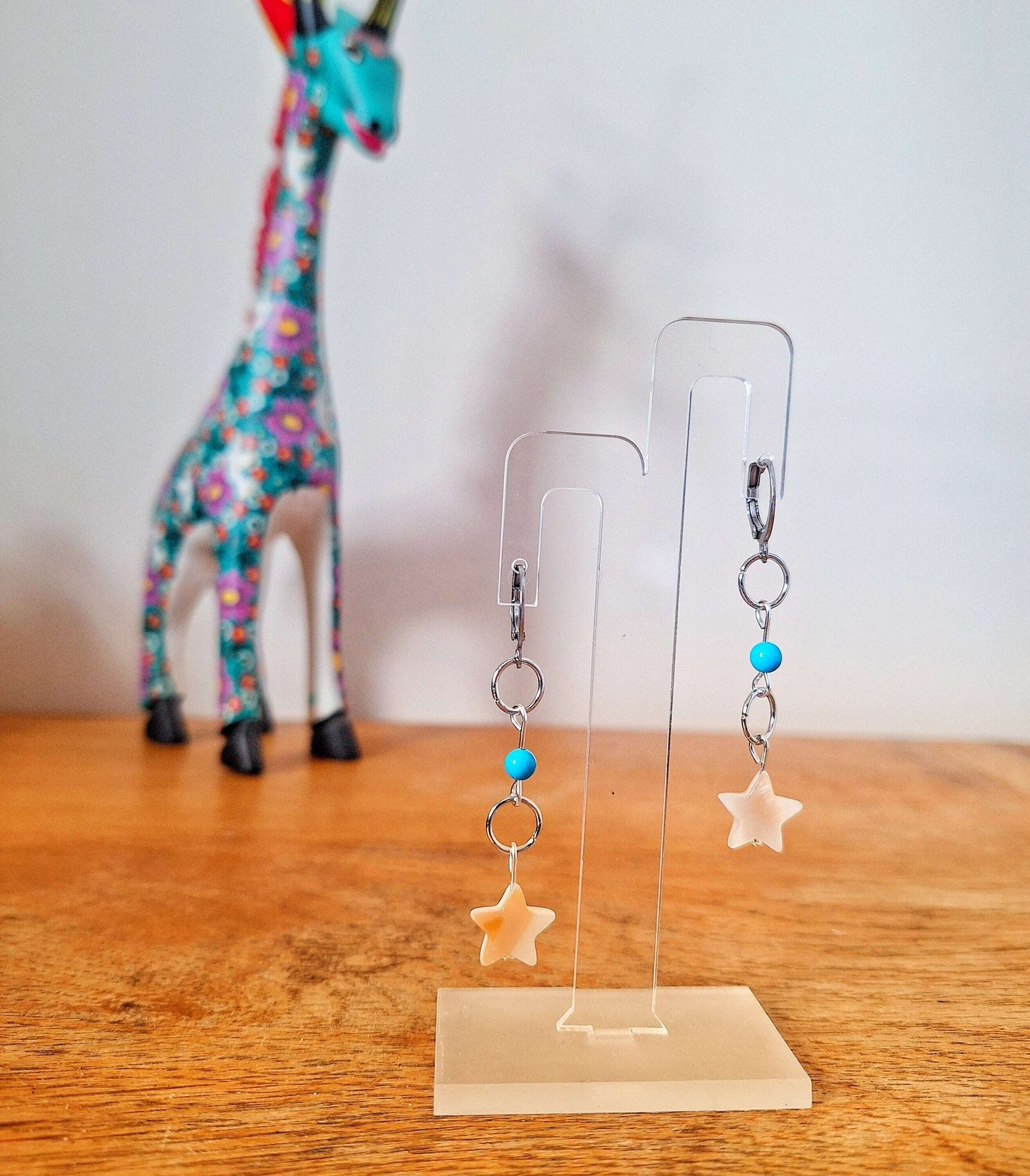 Cali Turquoise Star Earrings with mother of pearl and turquoise beads on stainless steel hoops.