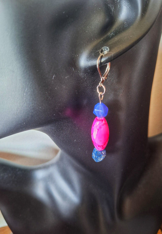 Freya Mismatched Earrings with repurposed glass beads on a black mannequin.