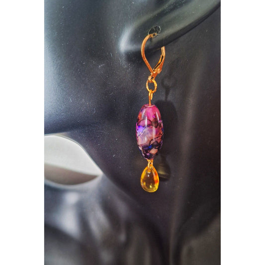 Colorful Lily mismatched earrings with purple and yellow beads, gold-plated lever back.