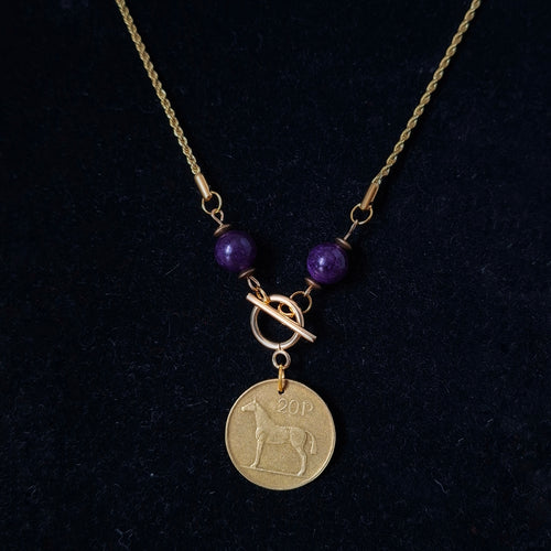 Necklace made with genuine Irish 1986 20p coin and repurposed amethyst beads. Suspended from gold-plated chain. By RainbowRegalia, Greystones, Co Wicklow.