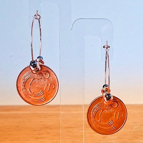 30mm wire hoop earrings made using genuine Irish pennies from 1996 and repurposed hematite beads. By RainbowRegalia, Greystones, Co Wicklow.