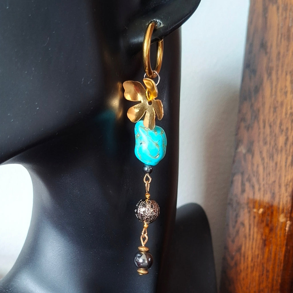 Pair of gold and turquoise long beaded earrings. Made with repurposed materials. Handmade by RainbowRegalia, Greystones, Co. Wicklow.