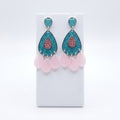 Teal and pink teardrop chandelier earrings.