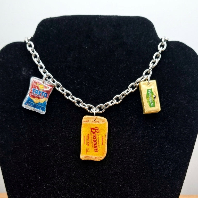 Today’s Bread, Tomorrow’s Hangover Necklace. Featuring Brennan’s, Tayto, and Kerrygold charms on a 43cm silver-toned chain.