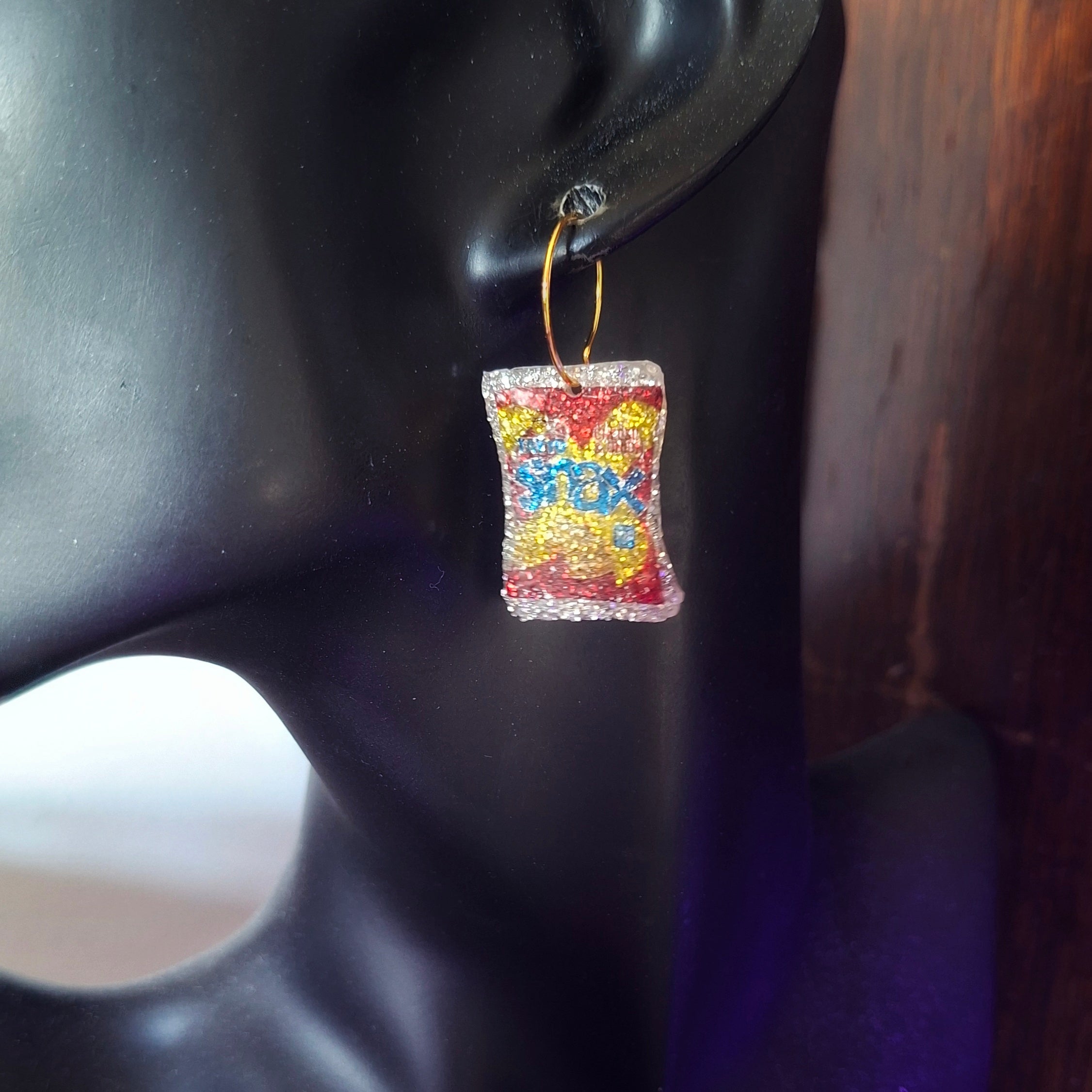 Hoop earring with Snax Charm