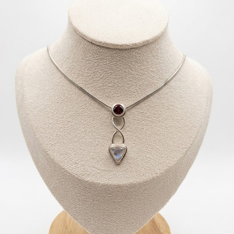 Sterling silver rainbow moonstone and garnet celtic necklace