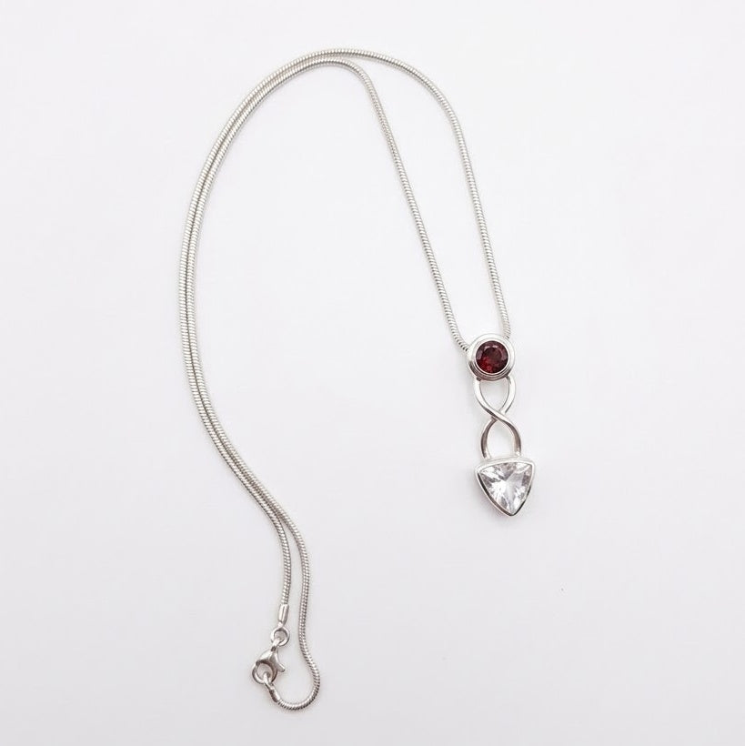 Sterling silver rainbow moonstone and garnet celtic necklace