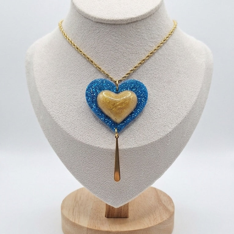 Blue and gold heart necklace on a gold-plated rope chain