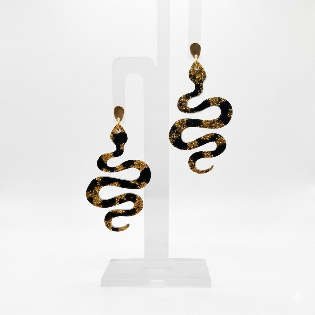 Handmade Black & Gold Resin Snake Earrings. Made in Wicklow by RainbowRegalia.