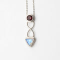 Sterling silver rainbow moonstone and garnet celtic necklace