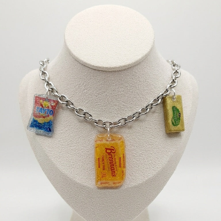 Today’s Bread, Tomorrow’s Hangover Necklace. Featuring Brennan’s, Tayto, and Kerrygold charms on a 43cm silver-toned chain.