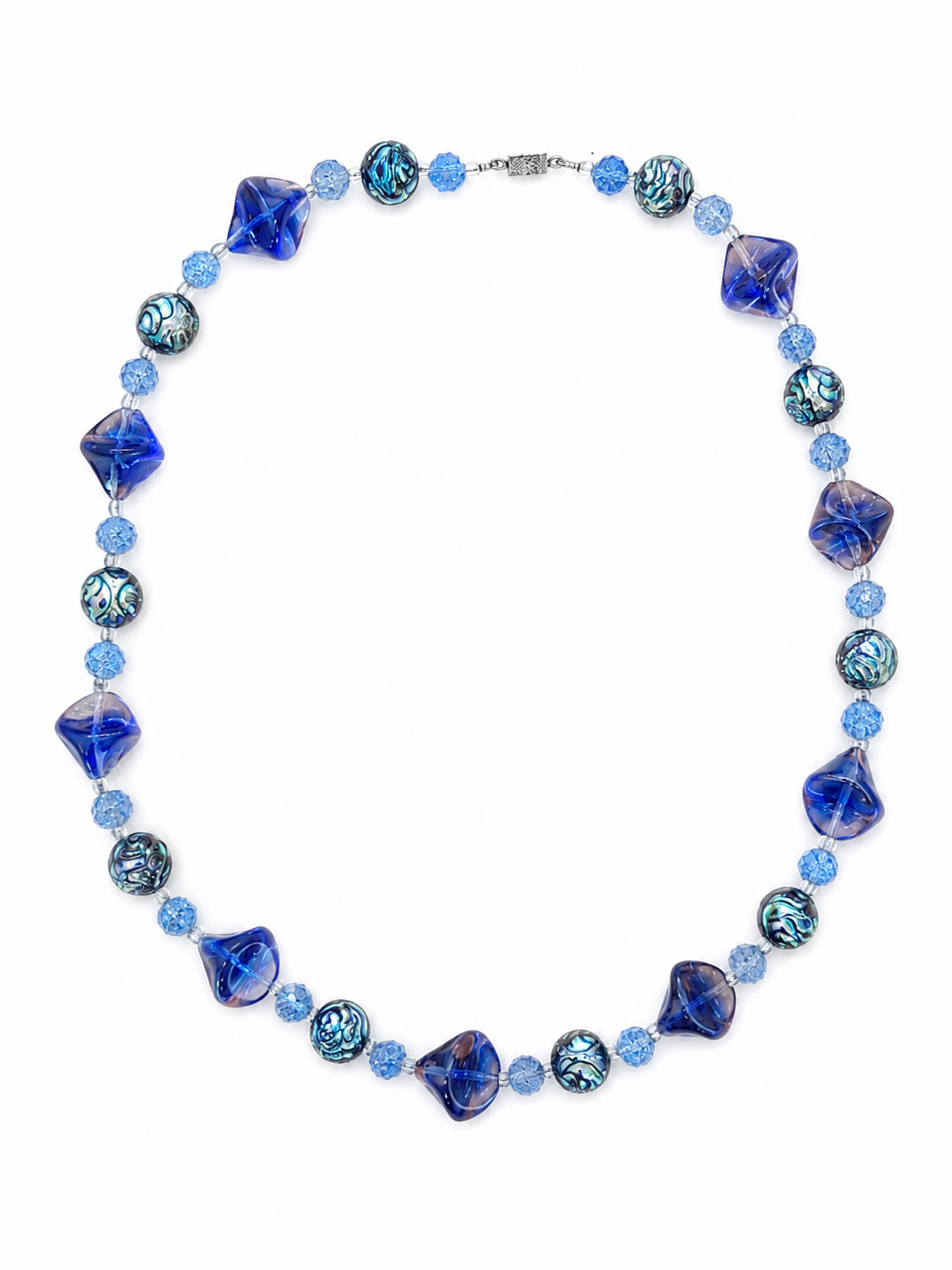 Vintage 1960s French glass necklace. A gorgeous bohemian statement piece featuring rich blue and iridescent caramel beads.