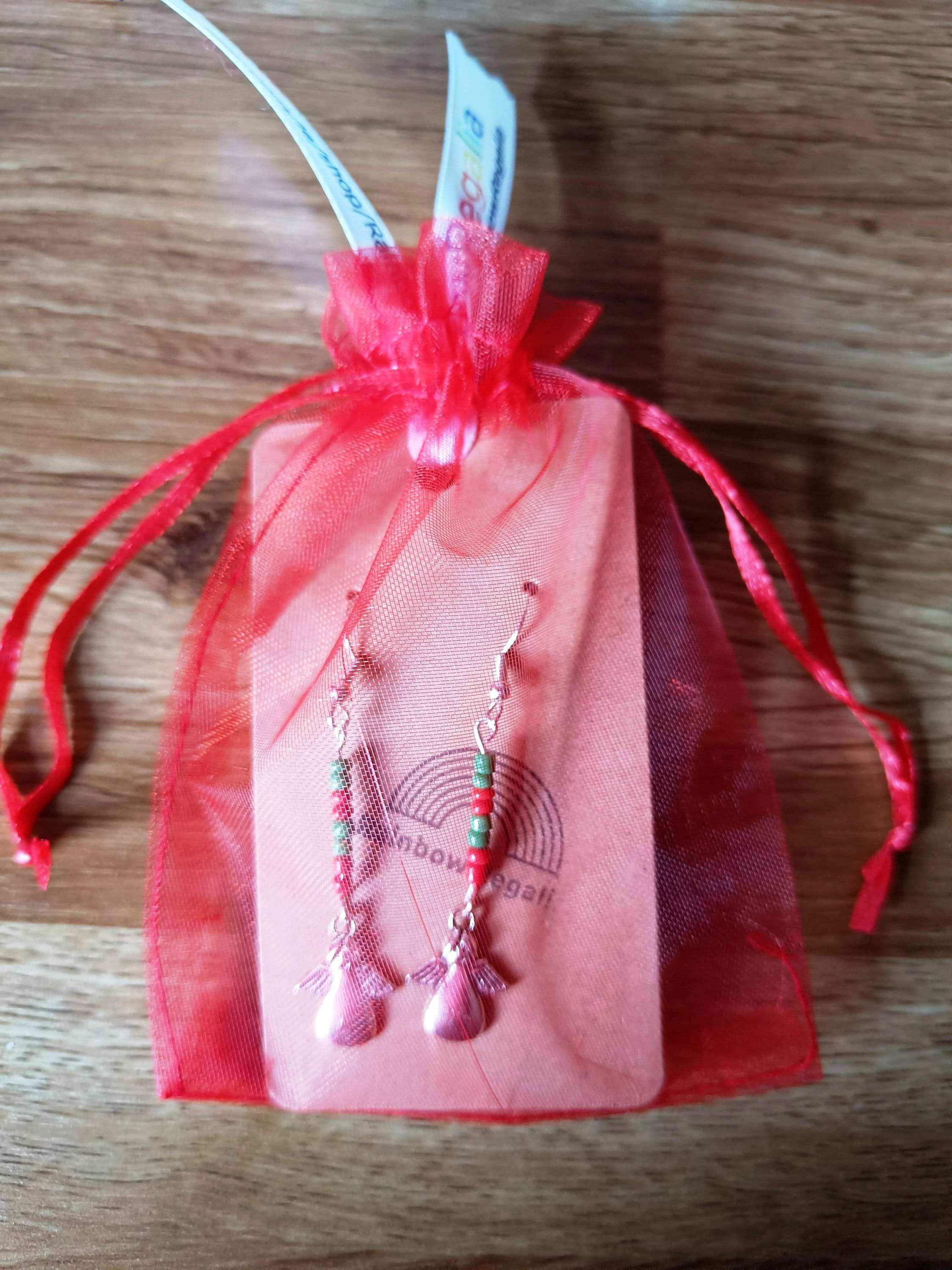 Red and Green Angel Earrings with repurposed glass seed beads in a red organza pouch.