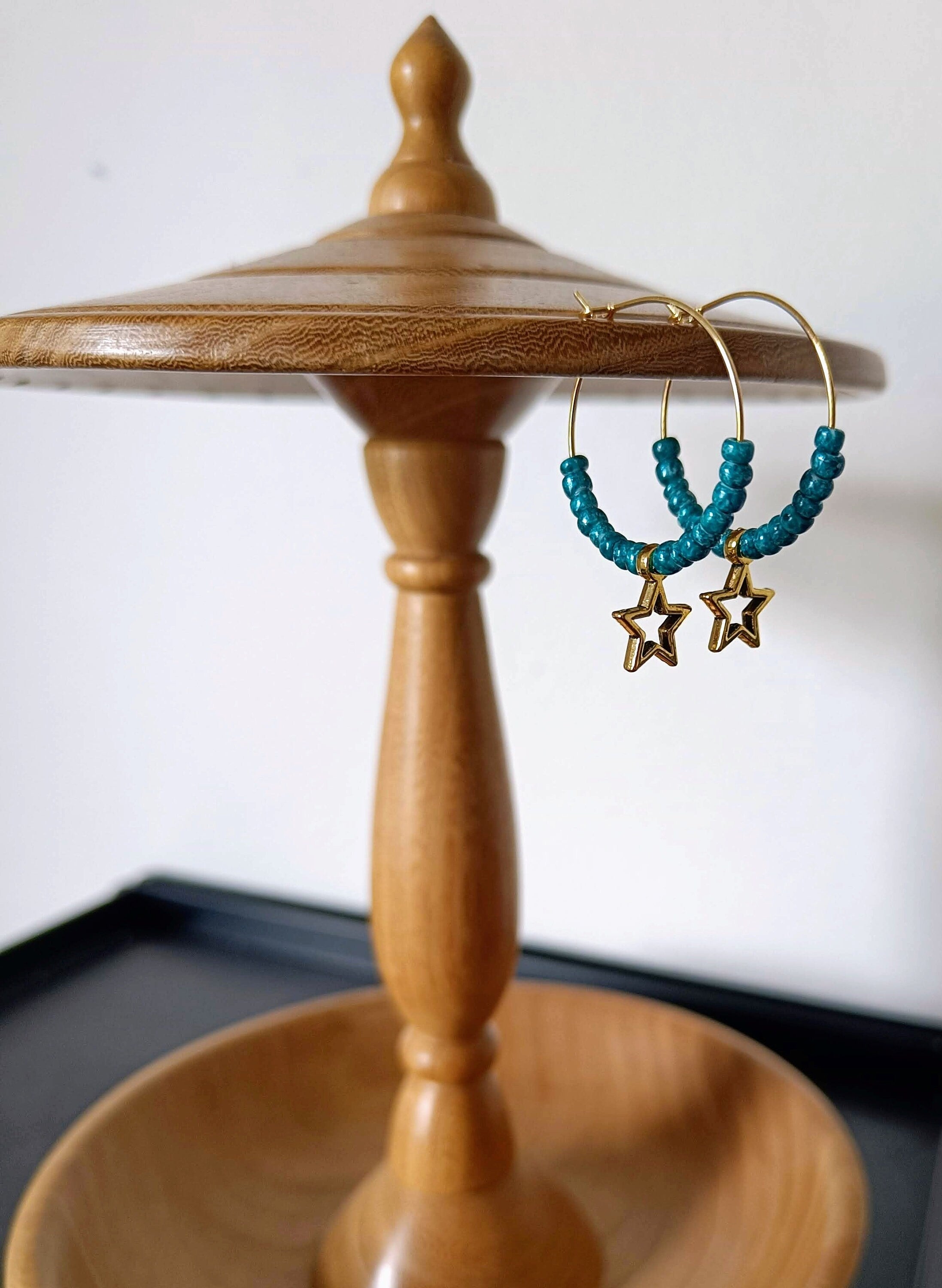 Teal Star Hoops with gold brass, teal ceramic beads, gold star charm, 25mm size.