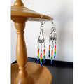 Rainbow chandelier earrings with repurposed glass seed beads and Tibetan silver accents.