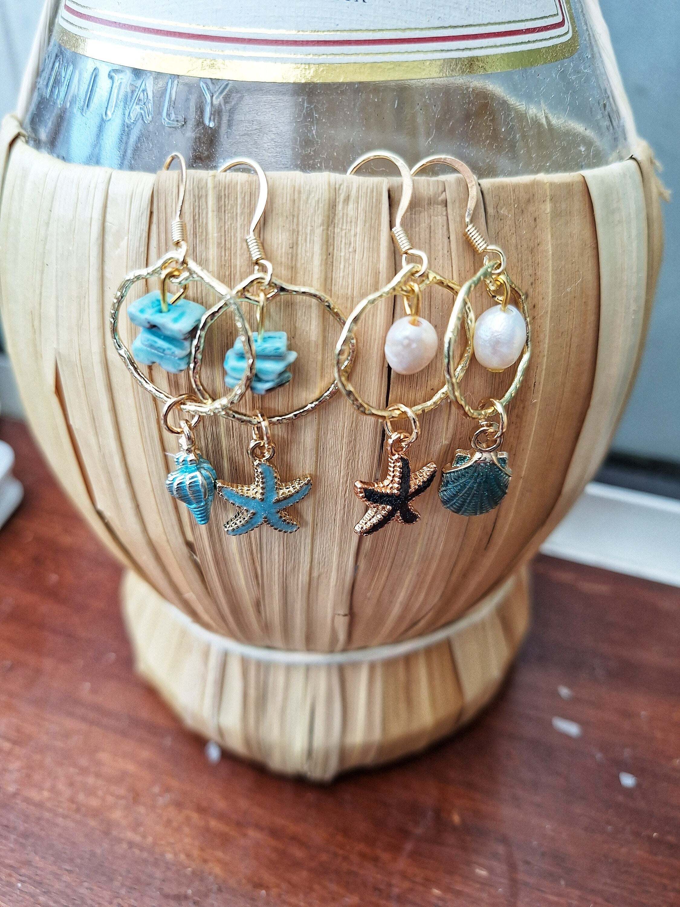 Mismatched Shell and Starfish Earrings with Gold, Coastal Charm Design.