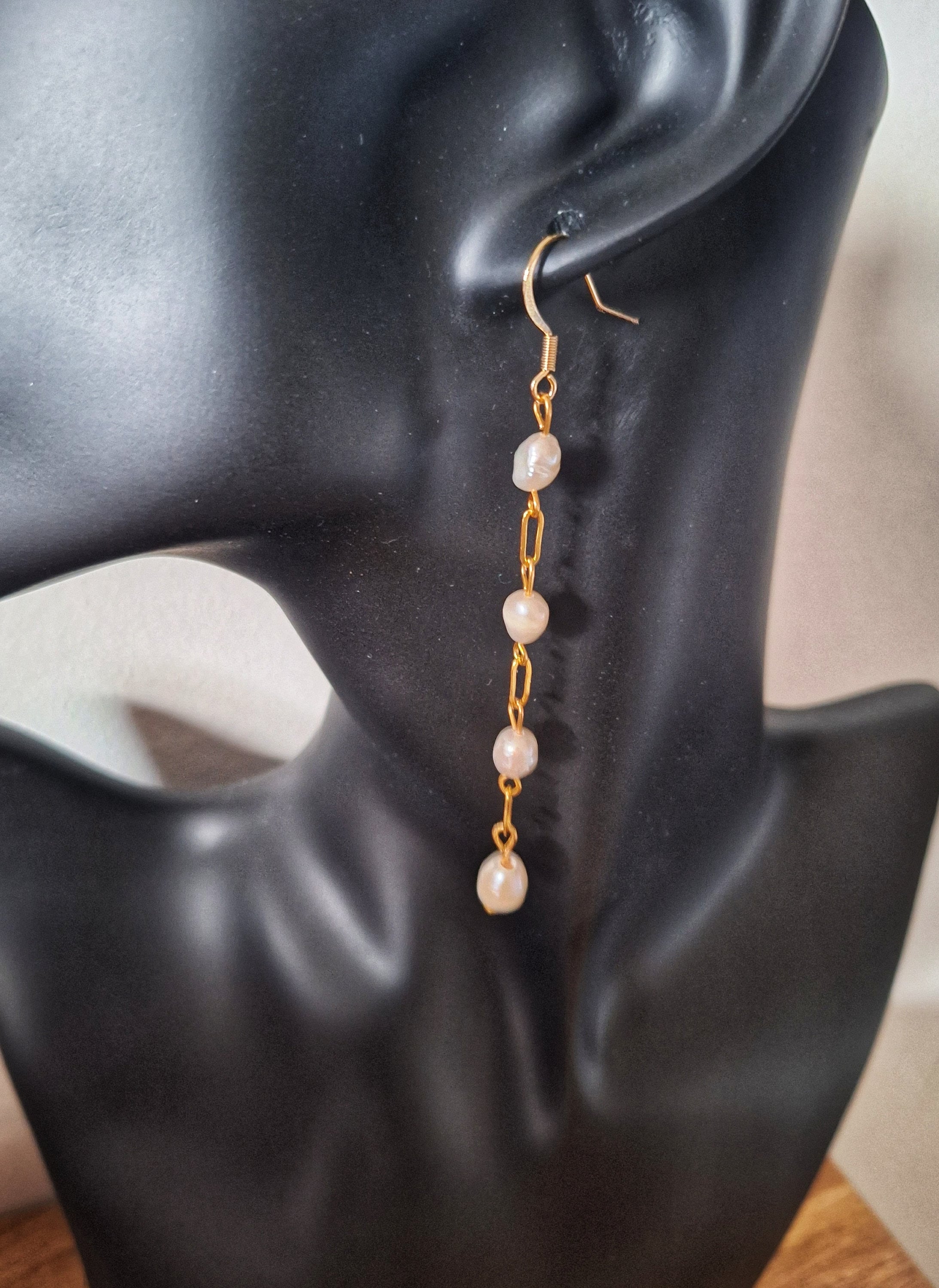Elegant Vivienne Pearl Drop Earrings in gold with freshwater pearls and gold-plated chain.