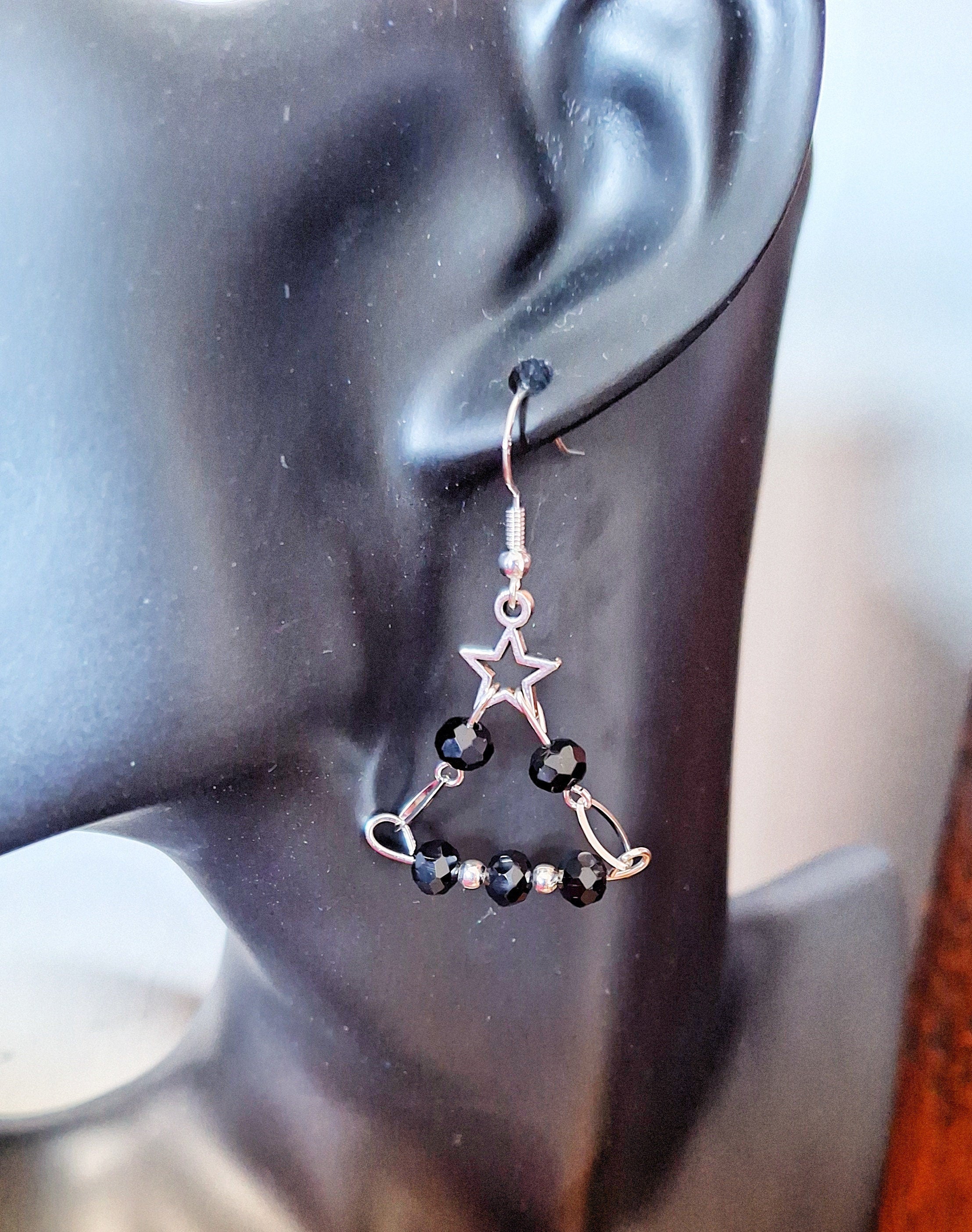 Eve Chandelier Earrings with festive Christmas tree design and black glass beads on sterling silver ear wires.