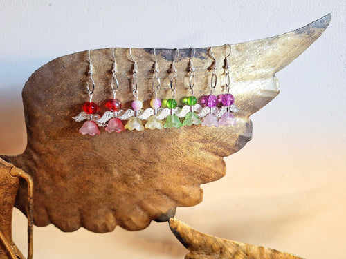Angelica Silver Angel Earrings with repurposed glass beads on a wing display