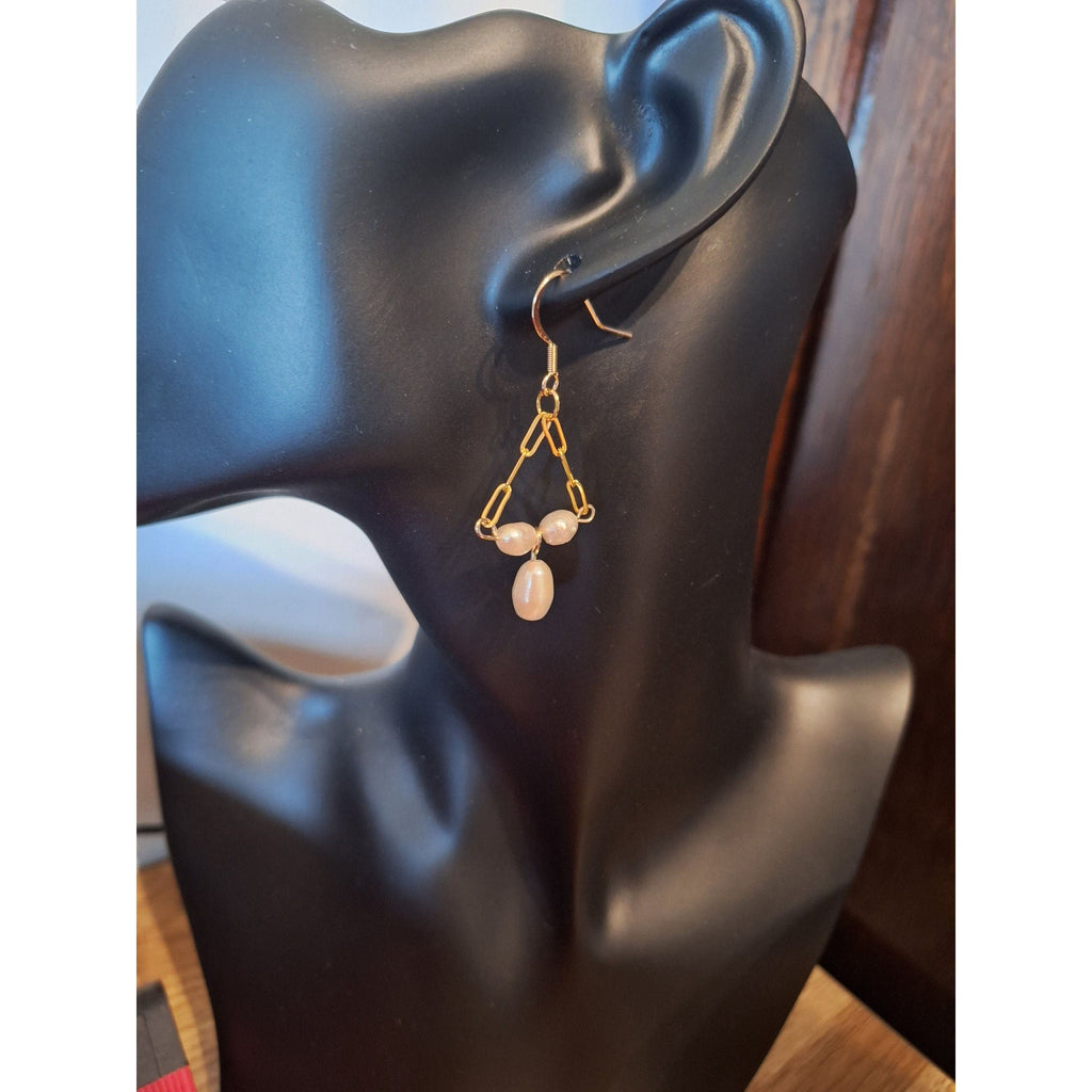 Victoria Pearl chandelier earrings with freshwater pearls on gold-plated chain.