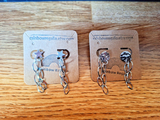 Eco-friendly Siouxsie Chain Drop Earrings with silver star and disc studs, crafted from repurposed stainless steel.