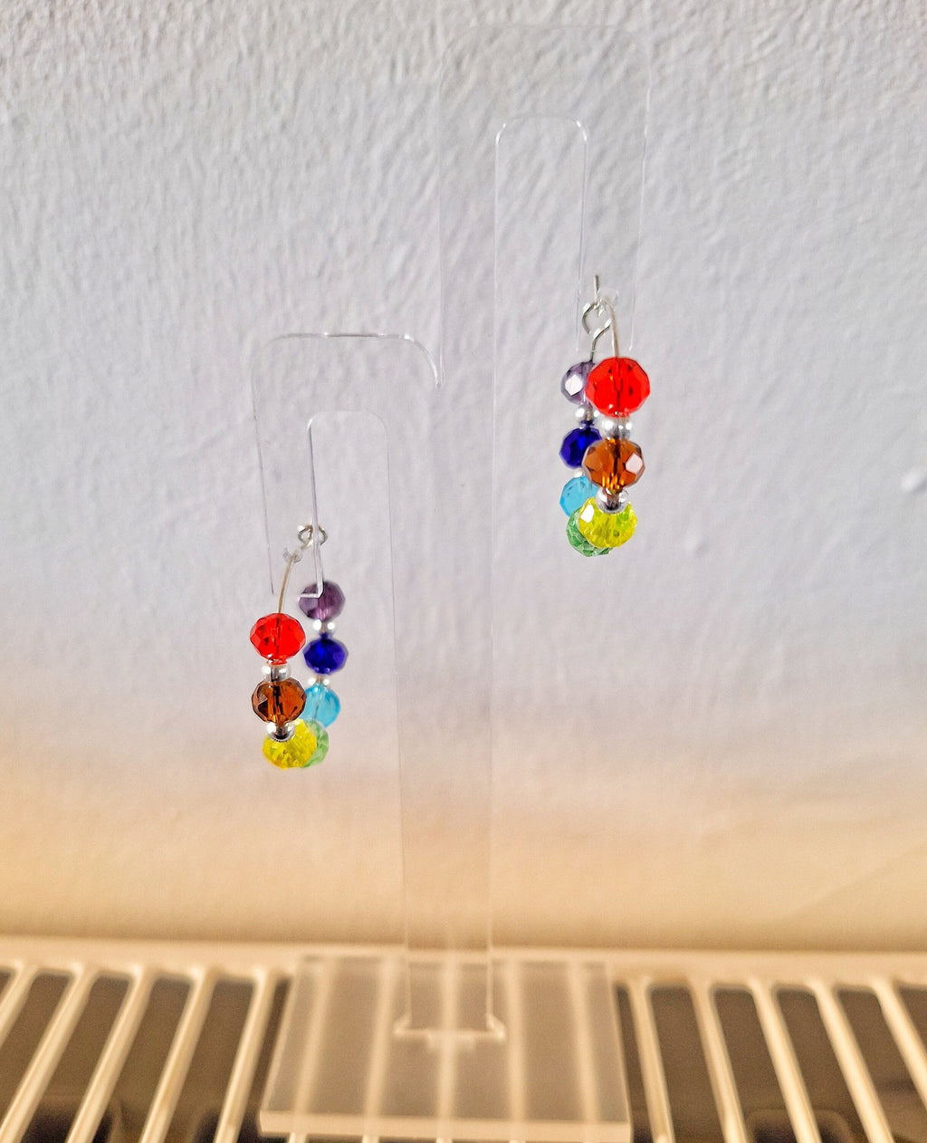 Linda Silver Beaded Hoops with colorful glass and ceramic beads on display.