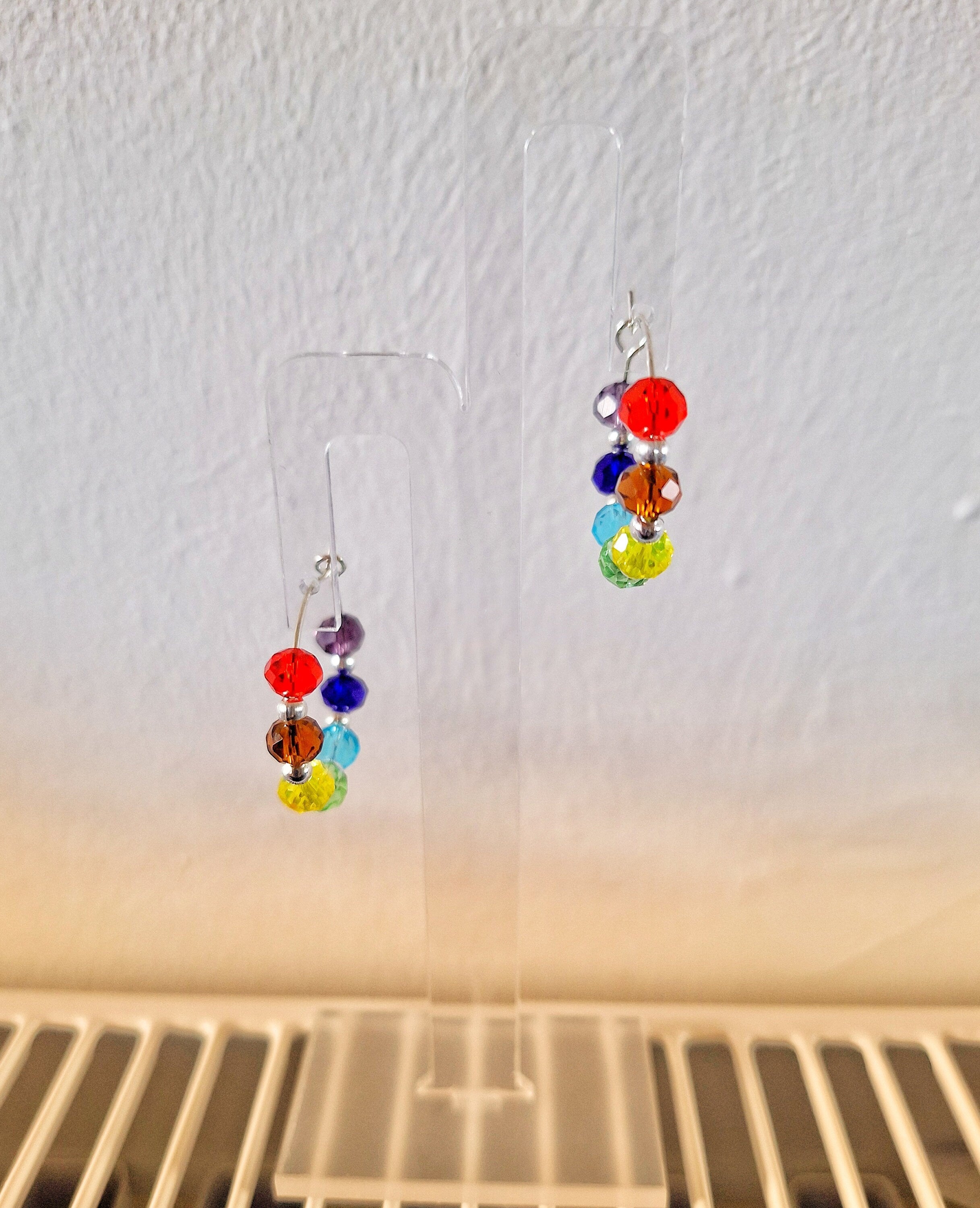 Linda Silver Beaded Hoops with colorful glass and ceramic beads on display.