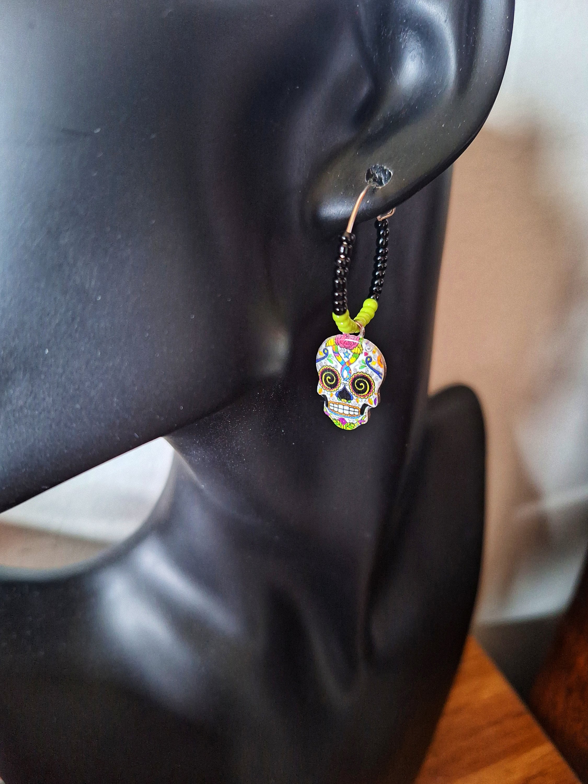 Calavera Hoop Earrings with skull charms and glass seed beads.